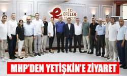 MHP’den Yetişkin’e ziyaret